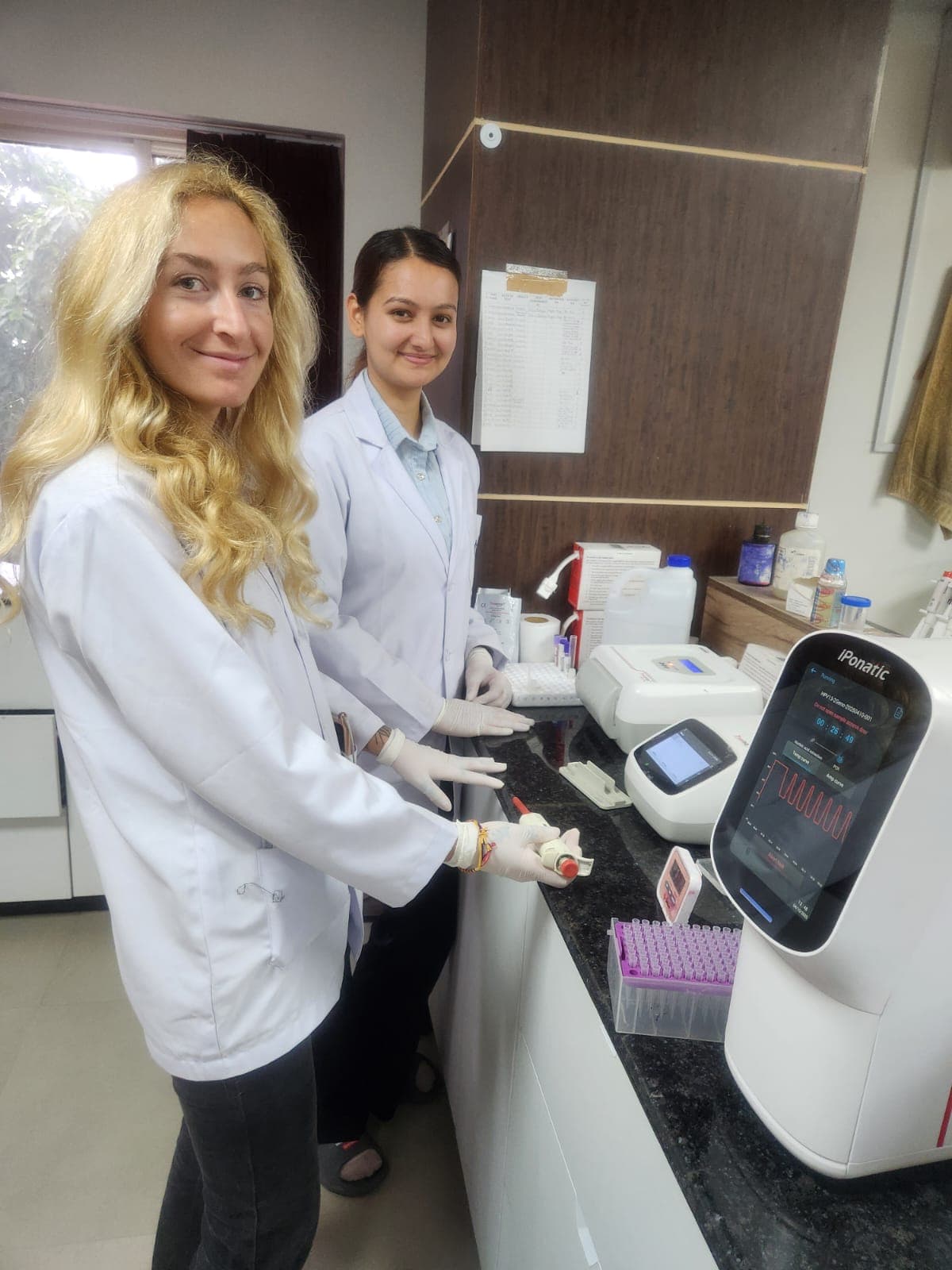 Ms. Laura working in the Life Quest Clinical Lab laboratory